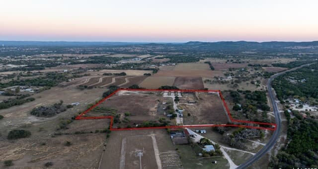 21.4 +/- AC  Fm 1077